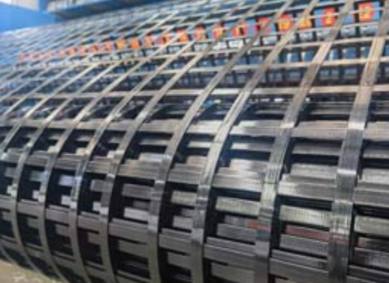 美兰钢塑土工格栅：基建“隐形脊梁”的绿色智造与长寿命进化论